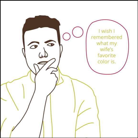 Man thinking "I wish I remembered what my wife's favorite color is".